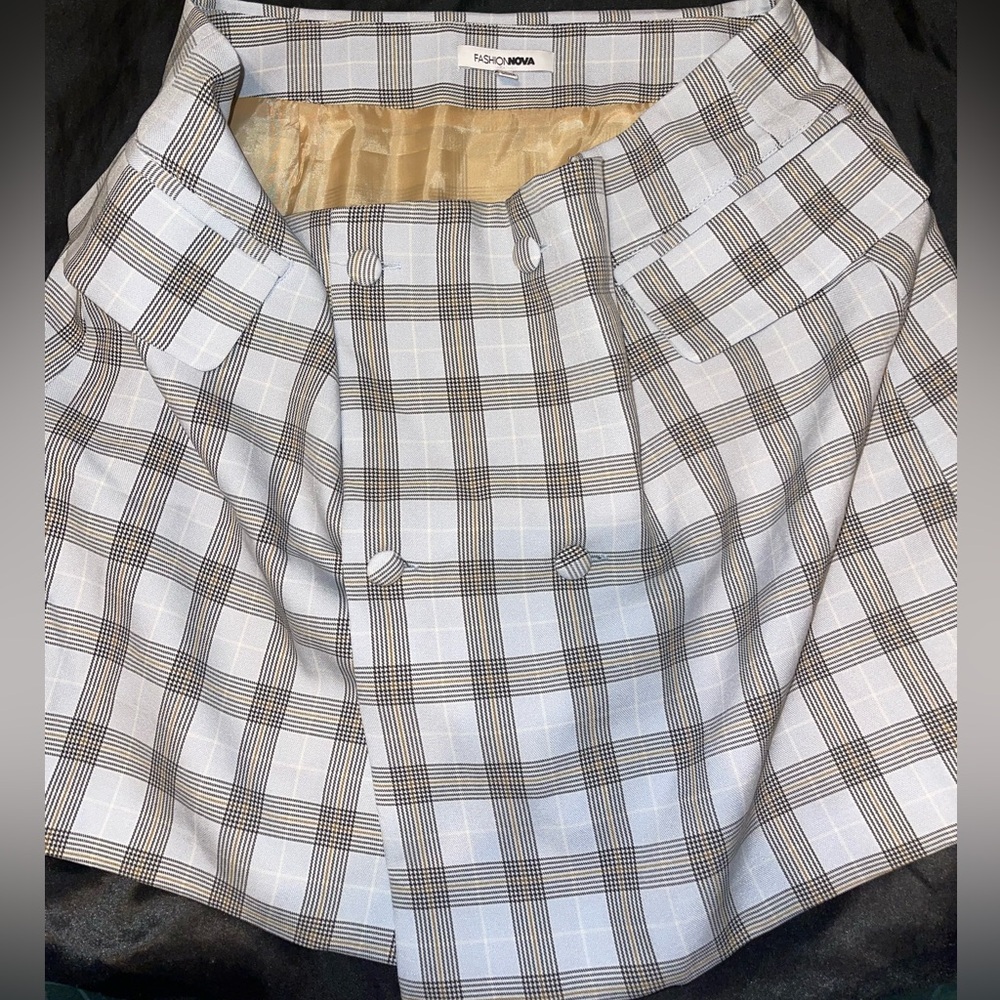 Fashion Nova 
Color Is Baby Blue. 
Has No Shorts Underneath. Not A Mini Skirt